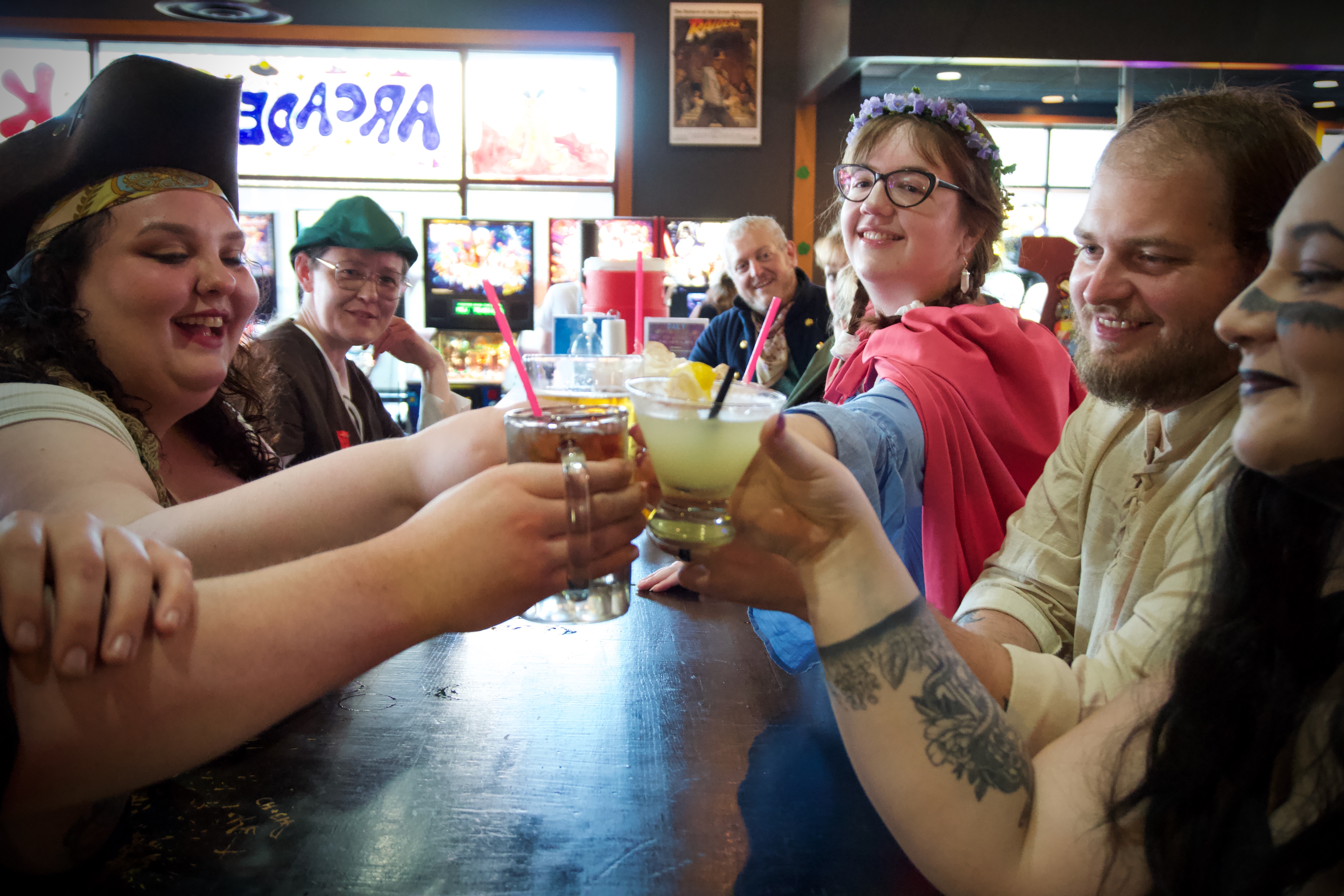 Tavern Key event guests toasting together